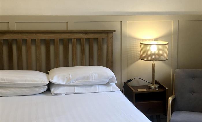 This room is situated on the first floor and has a large shower room.